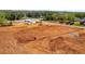 Graded land for sale in Buford, GA with easy access to nearby roadways at 409 Thunder Rd, Buford, GA 30518