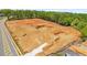 Graded land for sale in Buford, GA with easy access to nearby roadways at 409 Thunder Rd, Buford, GA 30518