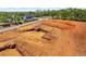 Graded land for sale in Buford, GA with easy access to nearby residential area at 409 Thunder Rd, Buford, GA 30518