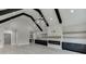 Open floor plan showcasing modern finishes, including dark cabinets and a fireplace at 409 Thunder Rd, Buford, GA 30518