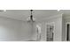 This bedroom features a view into an ensuite bath and walk-in closet at 409 Thunder Rd, Buford, GA 30518
