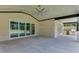 Covered patio with outdoor kitchen and ample space for entertaining at 409 Thunder Rd, Buford, GA 30518