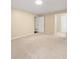 Large bedroom with neutral carpet and walls, showcasing ample space and natural light at 2605 Vineyard Se Way, Smyrna, GA 30082