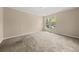 Neutral bedroom with carpet and natural light from one window at 2605 Vineyard Se Way, Smyrna, GA 30082