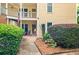 Charming condominium exterior, showcasing well-maintained landscaping and inviting curb appeal at 2605 Vineyard Se Way, Smyrna, GA 30082