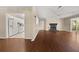 Spacious living room with hardwood floors, fireplace, and access to kitchen at 2605 Vineyard Se Way, Smyrna, GA 30082