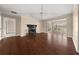 Open living room featuring a fireplace, recessed lighting, and a seamless flow to sunroom at 2605 Vineyard Se Way, Smyrna, GA 30082