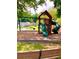 Community playground with a swing set, slide, and climbing structure, perfect for children at 2605 Vineyard Se Way, Smyrna, GA 30082