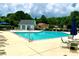 Inviting community pool area with sun loungers, tables, and chairs perfect for relaxation at 2605 Vineyard Se Way, Smyrna, GA 30082