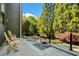 Backyard oasis with stone patio, seating area, and beautifully landscaped surroundings at 265 Tara Trl, Atlanta, GA 30327