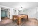 Basement game room featuring modern billiards table and hardwood floors at 265 Tara Trl, Atlanta, GA 30327