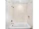 Clean white bathroom with a shower-tub combination featuring a tiled wall at 265 Tara Trl, Atlanta, GA 30327