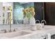 Detailed bathroom with marble countertop, modern faucets, and decorative vases at 265 Tara Trl, Atlanta, GA 30327