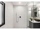 Contemporary bathroom with walk-in shower, modern fixtures, and elegant vanity at 265 Tara Trl, Atlanta, GA 30327