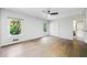 Spacious bedroom with hardwood floors, two windows, and ample natural light at 265 Tara Trl, Atlanta, GA 30327
