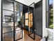 Sophisticated office entry with modern glass doors and a glimpse of the stylish interior at 265 Tara Trl, Atlanta, GA 30327