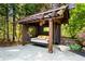 Backyard retreat with daybed swing, custom gazebo, and landscaping at 265 Tara Trl, Atlanta, GA 30327