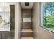 Elaborate walk-in shower with multiple shower heads and a built-in seat at 265 Tara Trl, Atlanta, GA 30327