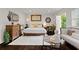 Bright and stylish bedroom with hardwood floors and modern decor at 3143 Church St, East Point, GA 30344