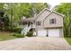 Charming two-story home with a two-car garage and welcoming front porch at 69 Due West Pass, Dallas, GA 30157