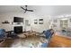 Comfortable living room with a fireplace, vaulted ceilings, and hardwood floors at 69 Due West Pass, Dallas, GA 30157