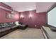 Home theater featuring a large screen, projector and comfortable seating at 8275 Majors Ridge Way, Cumming, GA 30041