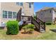 Backyard features a small wooden deck and a manicured lawn at 1005 Glen Ivy, Marietta, GA 30062