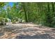 Fully fenced dog park surrounded by trees with benches inside at 1005 Glen Ivy, Marietta, GA 30062