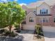 Beautiful townhouse featuring a brick facade, attached garage, and a professionally landscaped yard at 1005 Glen Ivy, Marietta, GA 30062