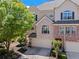 Beautiful townhouse featuring a brick facade, attached garage, and a professionally landscaped yard at 1005 Glen Ivy, Marietta, GA 30062