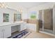 Elegant main bathroom with double vanity, a soaking tub, and a separate glass-enclosed shower at 1005 Glen Ivy, Marietta, GA 30062