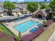 Aerial view of a community pool surrounded by lounge chairs, perfect for relaxing at 1005 Glen Ivy, Marietta, GA 30062