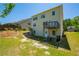 A spacious backyard featuring lush green grass, perfect for outdoor activities and enjoyment at 2649 Ogden Trl, Buford, GA 30519