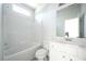 Bathroom with vanity, large mirror, and a shower over tub enclosure at 2649 Ogden Trl, Buford, GA 30519