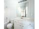 Bathroom with vanity, large mirror, and a shower over tub enclosure at 2649 Ogden Trl, Buford, GA 30519