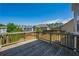 Spacious wooden deck overlooking a lush backyard, perfect for outdoor entertaining and relaxation at 2649 Ogden Trl, Buford, GA 30519