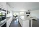 Bright kitchen boasts stainless steel appliances, granite countertops, and an open layout at 2649 Ogden Trl, Buford, GA 30519