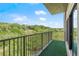 Balcony with scenic views of surrounding trees and blue sky at 2865 Lenox Ne Rd # 504, Atlanta, GA 30324