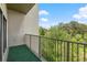 Balcony with a railing overlooking lush greenery at 2865 Lenox Ne Rd # 504, Atlanta, GA 30324