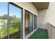 Balcony with sliding glass doors and green artificial turf flooring at 2865 Lenox Ne Rd # 504, Atlanta, GA 30324