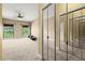 A light-filled bedroom with windows and mirrored closet doors at 2865 Lenox Ne Rd # 504, Atlanta, GA 30324