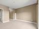 Neutral bedroom showcasing beige carpeting, base molding and a double door closet at 2865 Lenox Ne Rd # 504, Atlanta, GA 30324