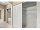 A well-organized closet with white slatted doors and wire shelving at 2865 Lenox Ne Rd # 504, Atlanta, GA 30324
