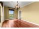 Bright dining room featuring beautiful hardwood floors, base molding, chandelier and bright windows at 2865 Lenox Ne Rd # 504, Atlanta, GA 30324