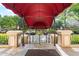 Covered awning at the entrance overlooking a parking area with several cars at 2865 Lenox Ne Rd # 504, Atlanta, GA 30324