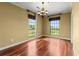 Sunny room featuring hardwood floors, base molding, window coverings and warm neutral paint at 2865 Lenox Ne Rd # 504, Atlanta, GA 30324