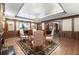 Elegant waiting area with hardwood floors, chandelier, fireplace, and stylish chairs at 2865 Lenox Ne Rd # 504, Atlanta, GA 30324