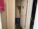 Bathroom with shower, built-in storage, and laundry hamper at 4206 Shoreside Cir, Snellville, GA 30039