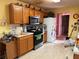 Kitchen featuring stainless steel appliances, ample counter space, and classic wooden cabinets at 4206 Shoreside Cir, Snellville, GA 30039
