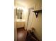 Bathroom featuring a vanity with storage, a mirror, and modern lighting fixtures at 574 Trillum Sw Ct, Marietta, GA 30008